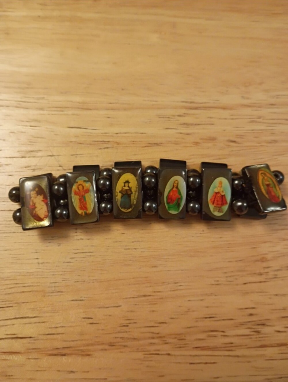 Religious Hematite Stretch Bracelet with Colorful Saint Panels